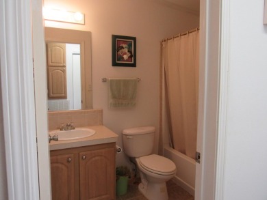 2005 Palm Harbor mobile home with a large (12x20) Florida room on Spanish Lakes Golf Village in Florida - for sale on GolfHomes.com, golf home, golf lot