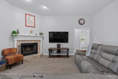 Welcome to your dream home at 3849 Saber Tooth Circle, nestled on Tiger Point Golf and Country Club in Florida - for sale on GolfHomes.com, golf home, golf lot