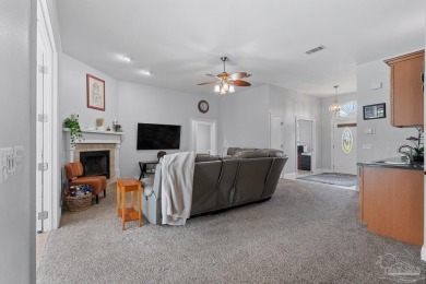 Welcome to your dream home at 3849 Saber Tooth Circle, nestled on Tiger Point Golf and Country Club in Florida - for sale on GolfHomes.com, golf home, golf lot