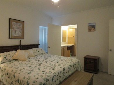 2005 Palm Harbor mobile home with a large (12x20) Florida room on Spanish Lakes Golf Village in Florida - for sale on GolfHomes.com, golf home, golf lot