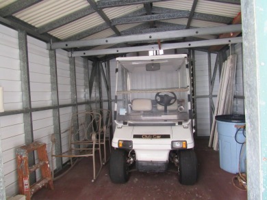 2005 Palm Harbor mobile home with a large (12x20) Florida room on Spanish Lakes Golf Village in Florida - for sale on GolfHomes.com, golf home, golf lot