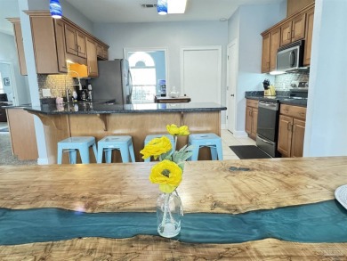 Welcome to your dream home at 3849 Saber Tooth Circle, nestled on Tiger Point Golf and Country Club in Florida - for sale on GolfHomes.com, golf home, golf lot