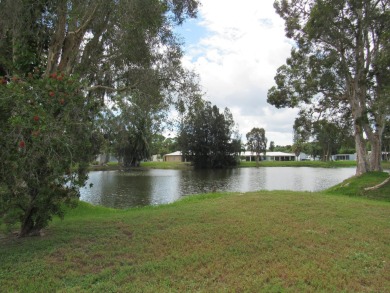 2005 Palm Harbor mobile home with a large (12x20) Florida room on Spanish Lakes Golf Village in Florida - for sale on GolfHomes.com, golf home, golf lot