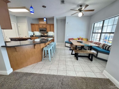 Welcome to your dream home at 3849 Saber Tooth Circle, nestled on Tiger Point Golf and Country Club in Florida - for sale on GolfHomes.com, golf home, golf lot