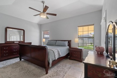 Welcome to your dream home at 3849 Saber Tooth Circle, nestled on Tiger Point Golf and Country Club in Florida - for sale on GolfHomes.com, golf home, golf lot