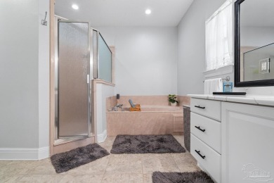 Welcome to your dream home at 3849 Saber Tooth Circle, nestled on Tiger Point Golf and Country Club in Florida - for sale on GolfHomes.com, golf home, golf lot