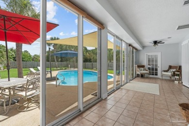 Welcome to your dream home at 3849 Saber Tooth Circle, nestled on Tiger Point Golf and Country Club in Florida - for sale on GolfHomes.com, golf home, golf lot