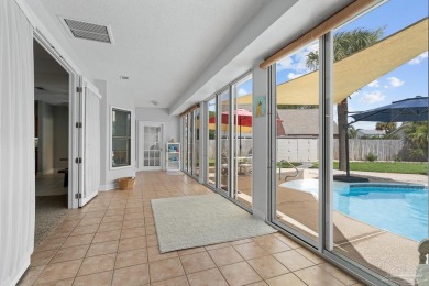 Welcome to your dream home at 3849 Saber Tooth Circle, nestled on Tiger Point Golf and Country Club in Florida - for sale on GolfHomes.com, golf home, golf lot