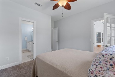 Welcome to your dream home at 3849 Saber Tooth Circle, nestled on Tiger Point Golf and Country Club in Florida - for sale on GolfHomes.com, golf home, golf lot