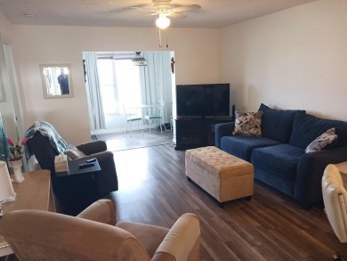 Fall in love with this 2Br/2Ba corner villa is ideally located on Leisureville Community Golf Course in Florida - for sale on GolfHomes.com, golf home, golf lot