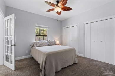 Welcome to your dream home at 3849 Saber Tooth Circle, nestled on Tiger Point Golf and Country Club in Florida - for sale on GolfHomes.com, golf home, golf lot