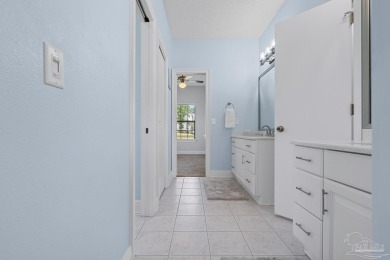 Welcome to your dream home at 3849 Saber Tooth Circle, nestled on Tiger Point Golf and Country Club in Florida - for sale on GolfHomes.com, golf home, golf lot