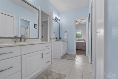 Welcome to your dream home at 3849 Saber Tooth Circle, nestled on Tiger Point Golf and Country Club in Florida - for sale on GolfHomes.com, golf home, golf lot