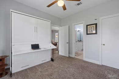 Welcome to your dream home at 3849 Saber Tooth Circle, nestled on Tiger Point Golf and Country Club in Florida - for sale on GolfHomes.com, golf home, golf lot