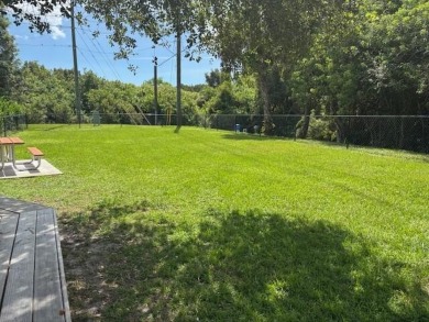 2005 Palm Harbor mobile home with a large (12x20) Florida room on Spanish Lakes Golf Village in Florida - for sale on GolfHomes.com, golf home, golf lot