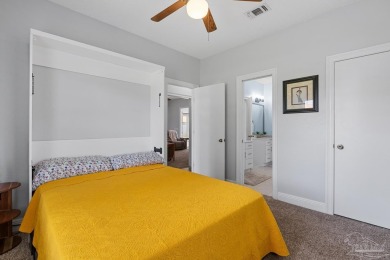 Welcome to your dream home at 3849 Saber Tooth Circle, nestled on Tiger Point Golf and Country Club in Florida - for sale on GolfHomes.com, golf home, golf lot