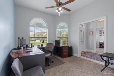 Welcome to your dream home at 3849 Saber Tooth Circle, nestled on Tiger Point Golf and Country Club in Florida - for sale on GolfHomes.com, golf home, golf lot
