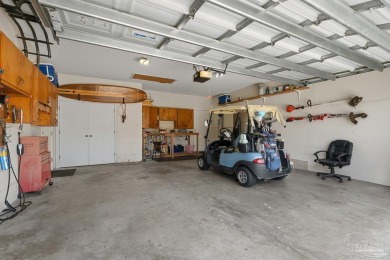 Welcome to your dream home at 3849 Saber Tooth Circle, nestled on Tiger Point Golf and Country Club in Florida - for sale on GolfHomes.com, golf home, golf lot