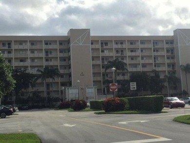 Enjoy breathtaking water views from this top-floor condo in the on Marina Lakes Golf Course in Florida - for sale on GolfHomes.com, golf home, golf lot