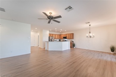 This beautifully maintained home has beautiful views of the golf on Aliante Golf Club in Nevada - for sale on GolfHomes.com, golf home, golf lot