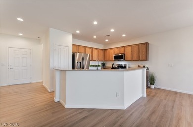 This beautifully maintained home has beautiful views of the golf on Aliante Golf Club in Nevada - for sale on GolfHomes.com, golf home, golf lot