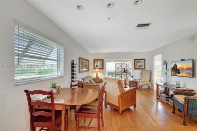 Welcome home to this cozy and bright corner villa condo in the on Leisureville Community Golf Course in Florida - for sale on GolfHomes.com, golf home, golf lot