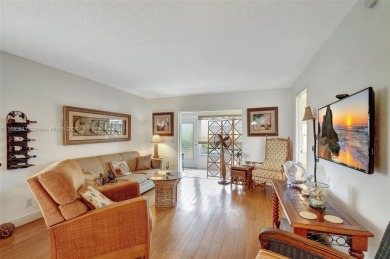 Welcome home to this cozy and bright corner villa condo in the on Leisureville Community Golf Course in Florida - for sale on GolfHomes.com, golf home, golf lot