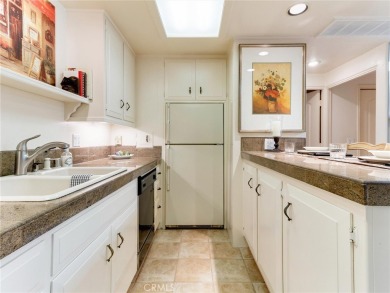 (Mutual 2-43-L)  WELCOME TO YOUR NEW HOME ... just wait till you on Leisure World Seal Beach Golf Course in California - for sale on GolfHomes.com, golf home, golf lot