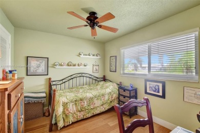 Welcome home to this cozy and bright corner villa condo in the on Leisureville Community Golf Course in Florida - for sale on GolfHomes.com, golf home, golf lot