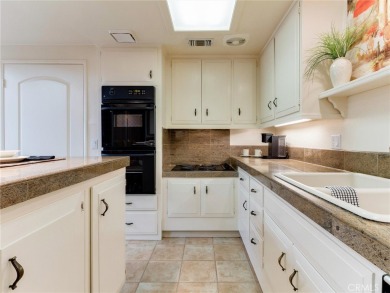 (Mutual 2-43-L)  WELCOME TO YOUR NEW HOME ... just wait till you on Leisure World Seal Beach Golf Course in California - for sale on GolfHomes.com, golf home, golf lot