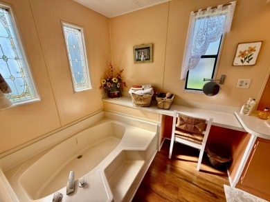 Home is located in Water Oak Country Club Estates in Lady Lake on Water Oak Country Club Estates in Florida - for sale on GolfHomes.com, golf home, golf lot