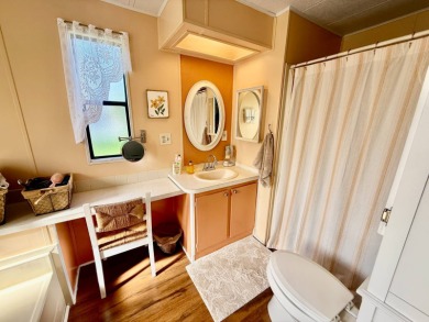 Home is located in Water Oak Country Club Estates in Lady Lake on Water Oak Country Club Estates in Florida - for sale on GolfHomes.com, golf home, golf lot
