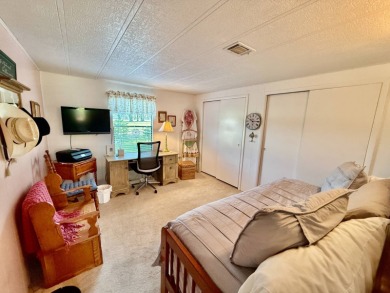 Home is located in Water Oak Country Club Estates in Lady Lake on Water Oak Country Club Estates in Florida - for sale on GolfHomes.com, golf home, golf lot