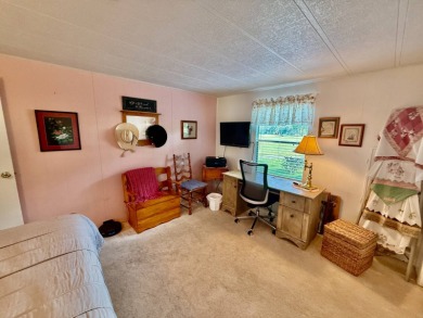 Home is located in Water Oak Country Club Estates in Lady Lake on Water Oak Country Club Estates in Florida - for sale on GolfHomes.com, golf home, golf lot