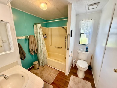 Home is located in Water Oak Country Club Estates in Lady Lake on Water Oak Country Club Estates in Florida - for sale on GolfHomes.com, golf home, golf lot