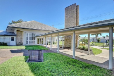 Welcome home to this cozy and bright corner villa condo in the on Leisureville Community Golf Course in Florida - for sale on GolfHomes.com, golf home, golf lot