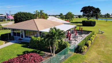 Welcome home to this cozy and bright corner villa condo in the on Leisureville Community Golf Course in Florida - for sale on GolfHomes.com, golf home, golf lot