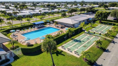 Welcome home to this cozy and bright corner villa condo in the on Leisureville Community Golf Course in Florida - for sale on GolfHomes.com, golf home, golf lot