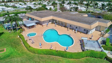 Welcome home to this cozy and bright corner villa condo in the on Leisureville Community Golf Course in Florida - for sale on GolfHomes.com, golf home, golf lot