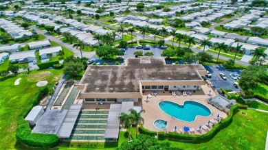 Welcome home to this cozy and bright corner villa condo in the on Leisureville Community Golf Course in Florida - for sale on GolfHomes.com, golf home, golf lot