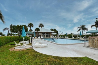 Welcome home to this cozy and bright corner villa condo in the on Leisureville Community Golf Course in Florida - for sale on GolfHomes.com, golf home, golf lot