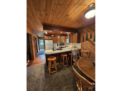 Cute as a button cabin in a great in town location! This 3 on McCall Municipal Golf Course in Idaho - for sale on GolfHomes.com, golf home, golf lot