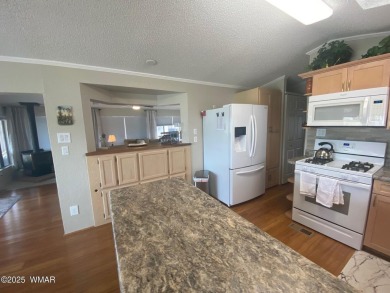 LOCATION LOCATION !   This lovely updated home is located on the on Juniper Ridge R.V. Golf Resort in Arizona - for sale on GolfHomes.com, golf home, golf lot