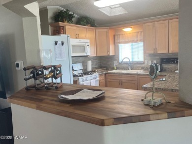 LOCATION LOCATION !   This lovely updated home is located on the on Juniper Ridge R.V. Golf Resort in Arizona - for sale on GolfHomes.com, golf home, golf lot