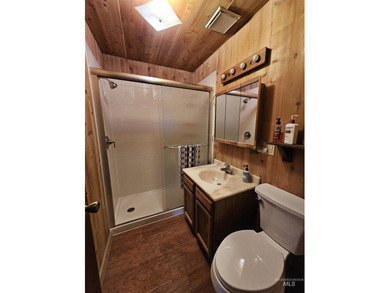 Cute as a button cabin in a great in town location! This 3 on McCall Municipal Golf Course in Idaho - for sale on GolfHomes.com, golf home, golf lot