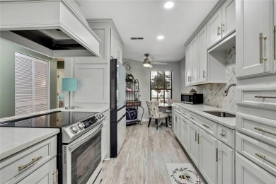 Discover this beautifully updated villa in the award-winning on Timber Pines Golf Course in Florida - for sale on GolfHomes.com, golf home, golf lot