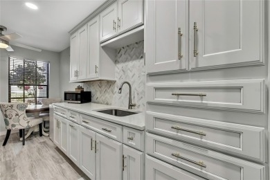 Discover this beautifully updated villa in the award-winning on Timber Pines Golf Course in Florida - for sale on GolfHomes.com, golf home, golf lot
