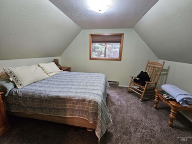 Cute as a button cabin in a great in town location! This 3 on McCall Municipal Golf Course in Idaho - for sale on GolfHomes.com, golf home, golf lot