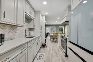 Discover this beautifully updated villa in the award-winning on Timber Pines Golf Course in Florida - for sale on GolfHomes.com, golf home, golf lot
