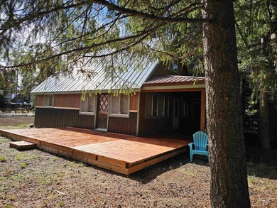 Cute as a button cabin in a great in town location! This 3 on McCall Municipal Golf Course in Idaho - for sale on GolfHomes.com, golf home, golf lot